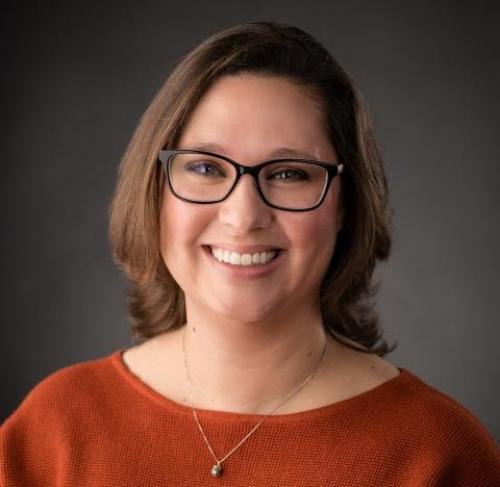 Headshot photograph of Sarah Matteson, Director of Material and Management