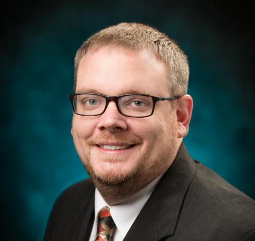 Headshot photograph of Dr. William Dixon, Chief Medical Officer