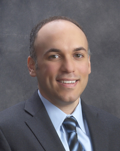 Headshot photograph of Dr. Isidoros Vardaros